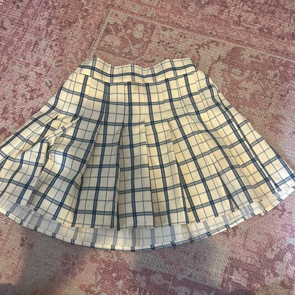 Blue plaid mini skirt with pleats